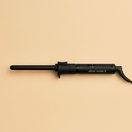 Fer à boucler rotatif